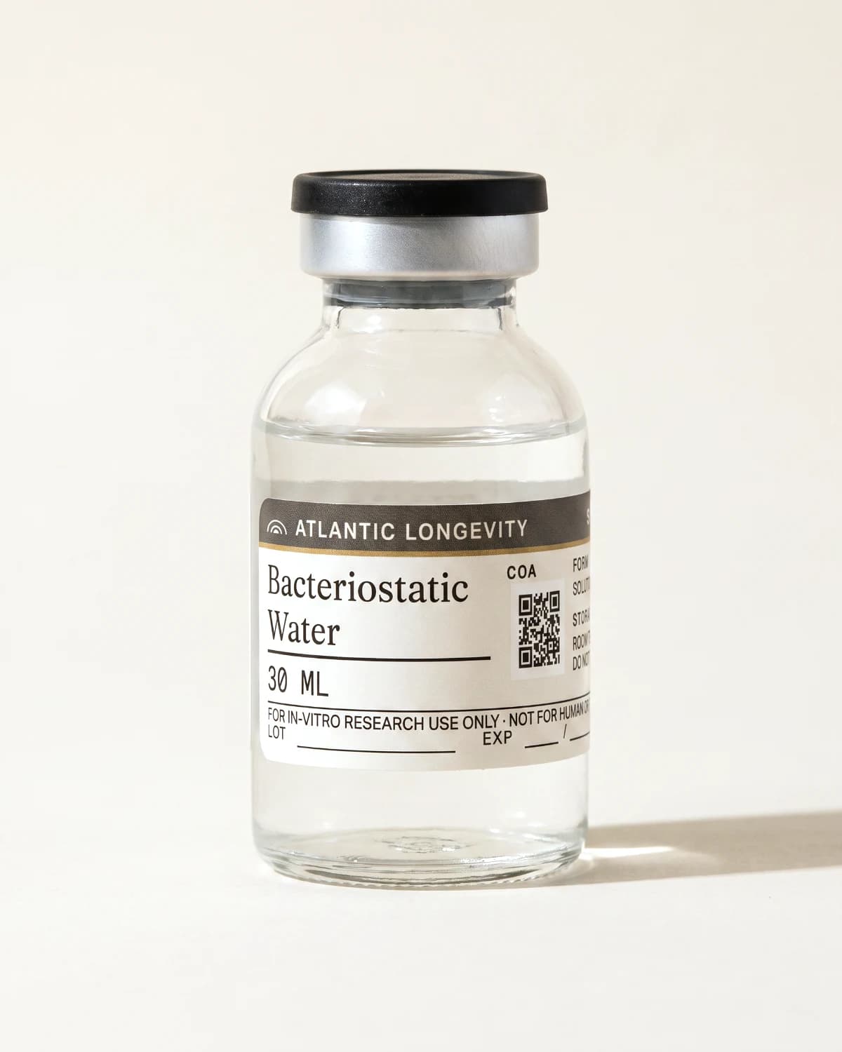 Bacteriostatic Water 30 ml multi-dose vial with Atlantic Longevity label, on bone paper