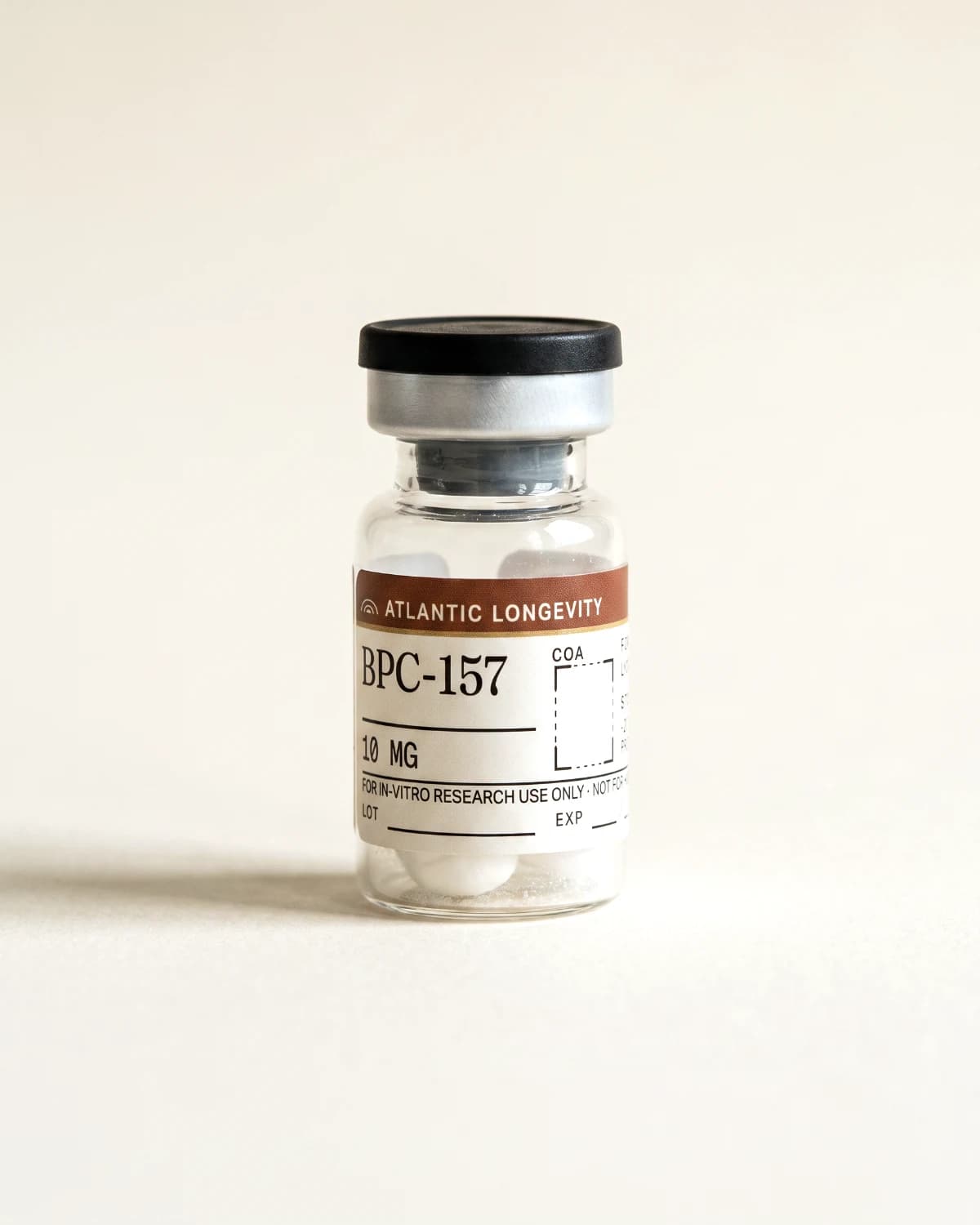 BPC-157 vial with Atlantic Longevity batch label, lot and expiry write-in fields, on bone paper