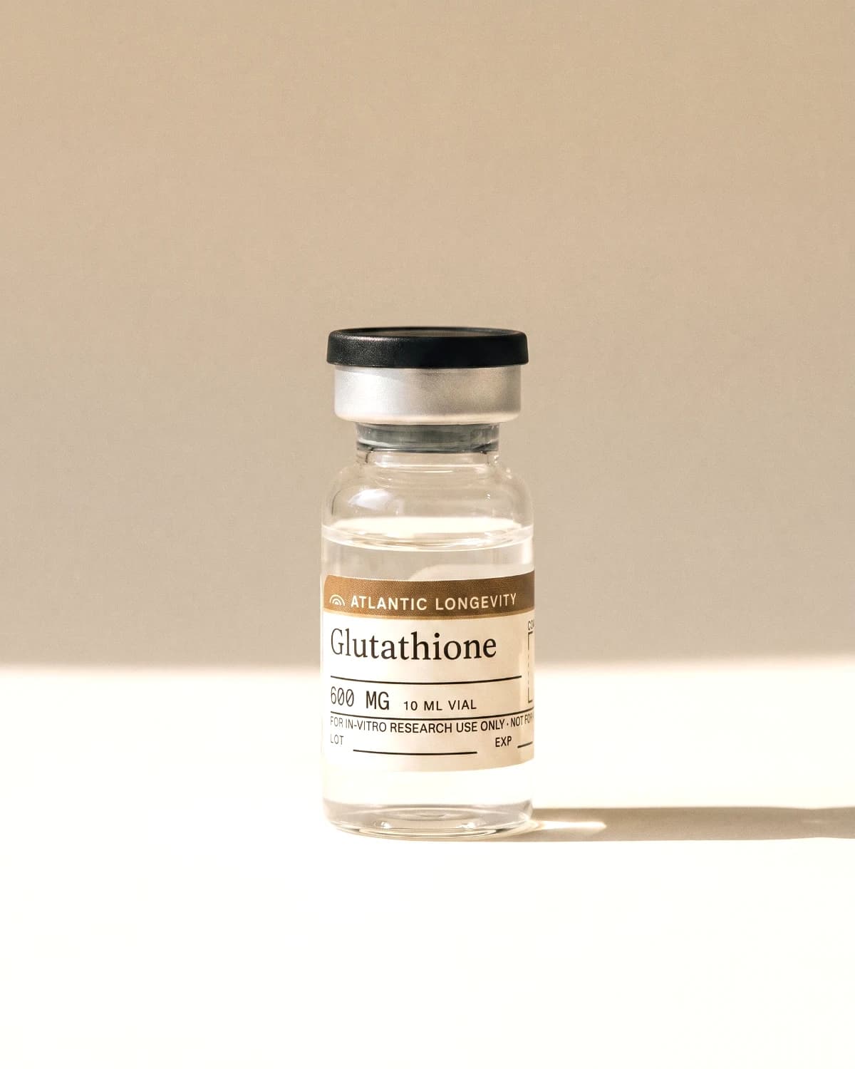 Glutathione vial with Atlantic Longevity batch label, lot and expiry write-in fields, on bone paper