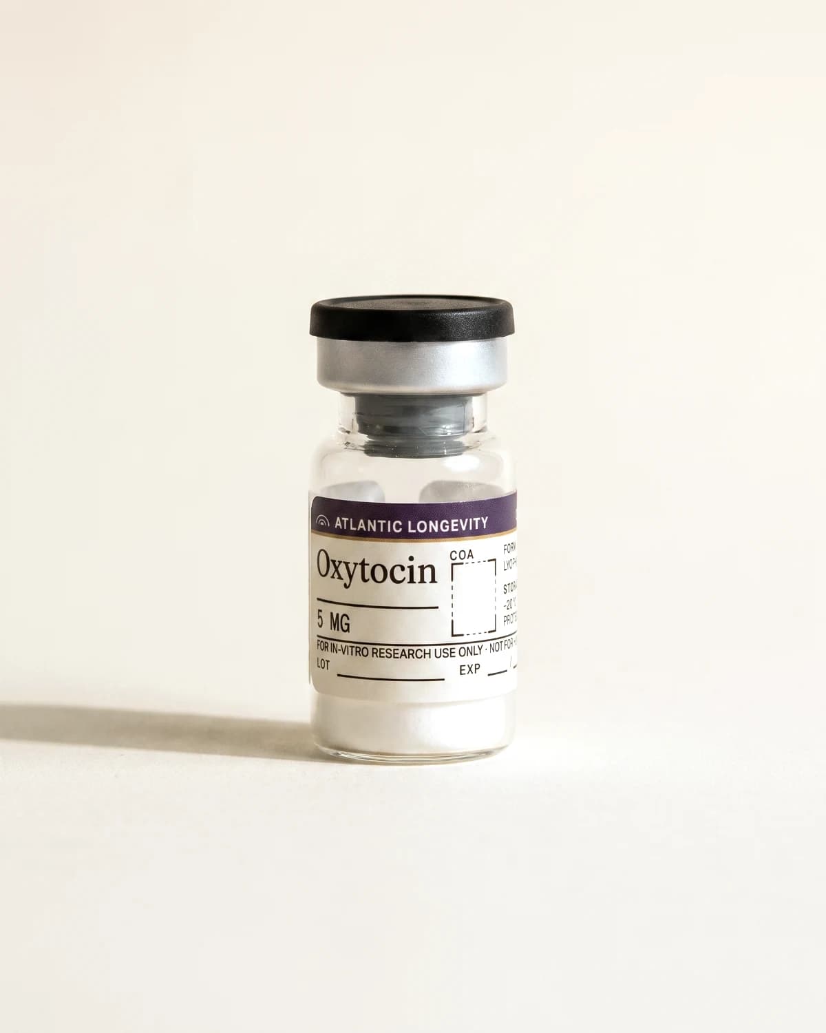 Oxytocin vial with Atlantic Longevity batch label, lot and expiry write-in fields, on bone paper