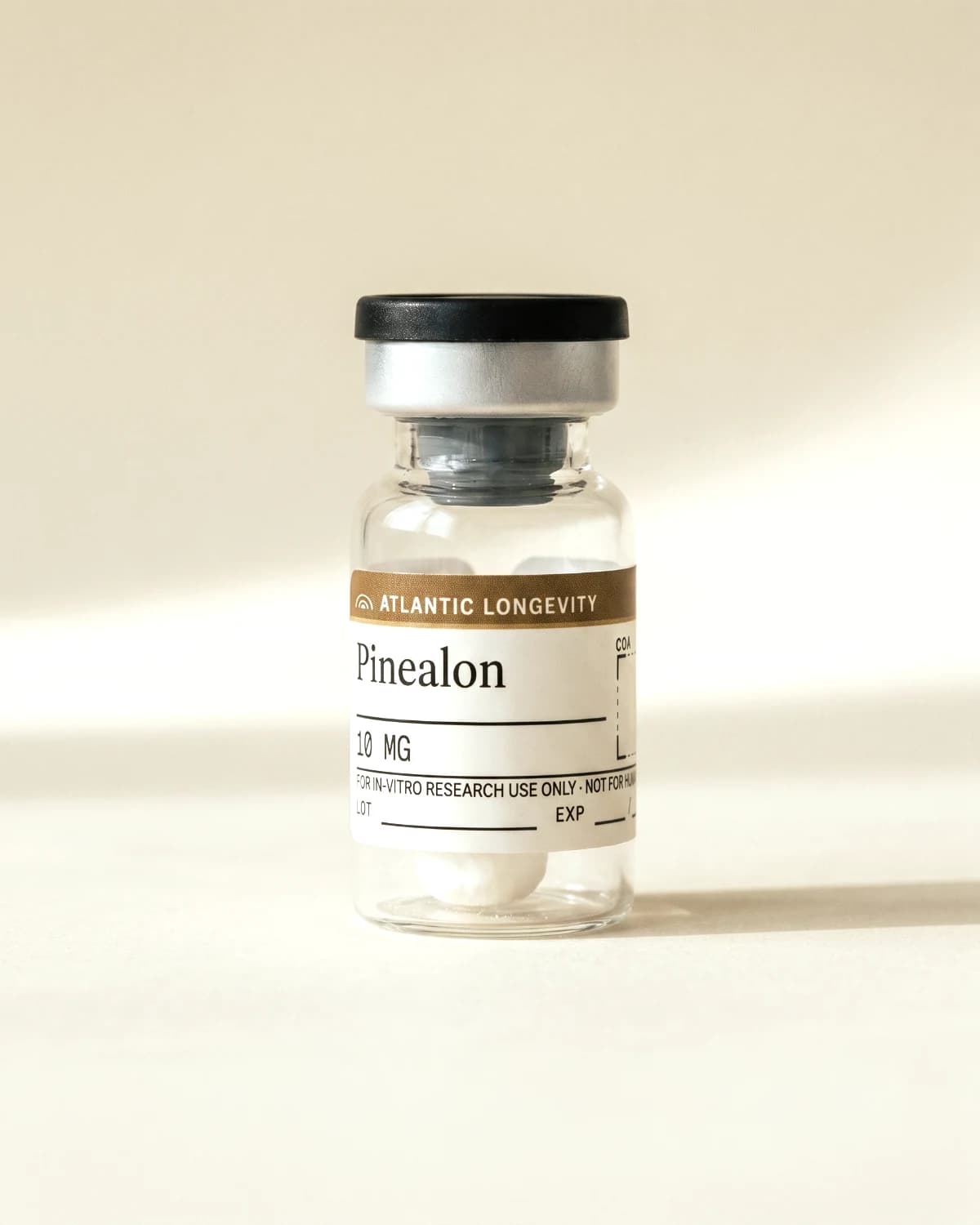 Pinealon vial with Atlantic Longevity batch label, lot and expiry write-in fields, on bone paper