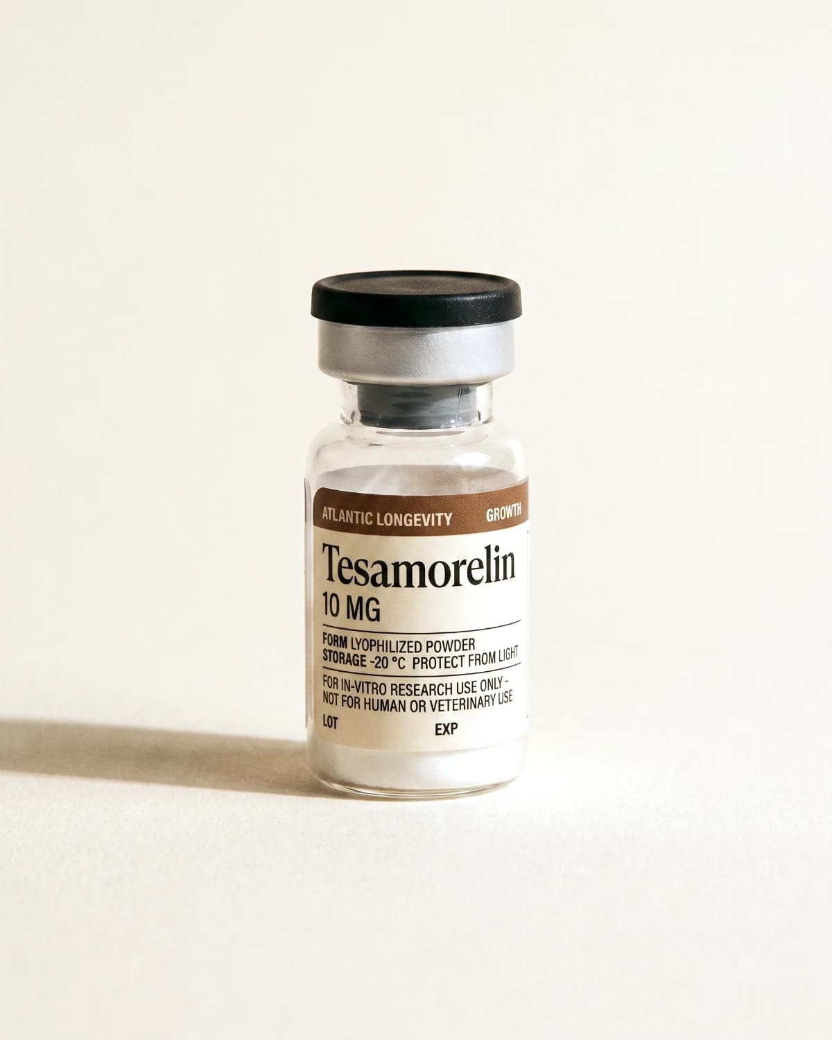 Tesamorelin vial with Atlantic Longevity batch label, lot and expiry write-in fields, on bone paper